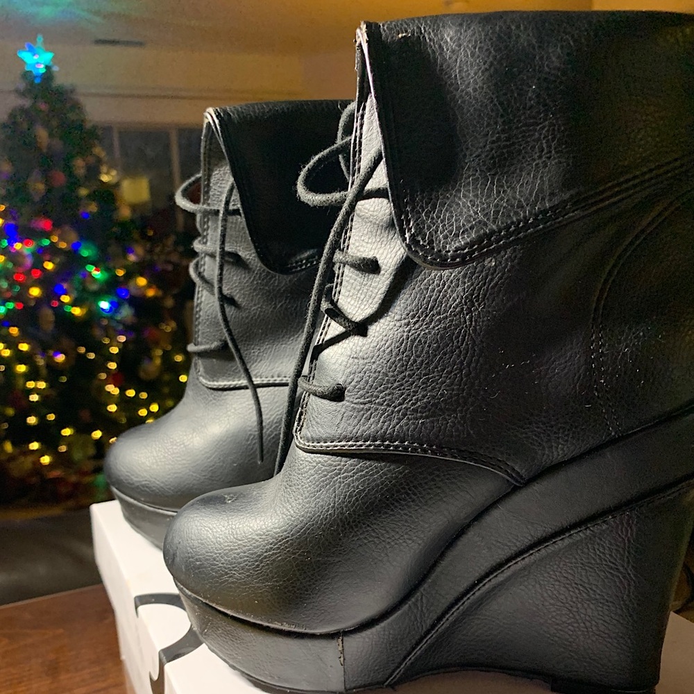 Black leather wedge boots